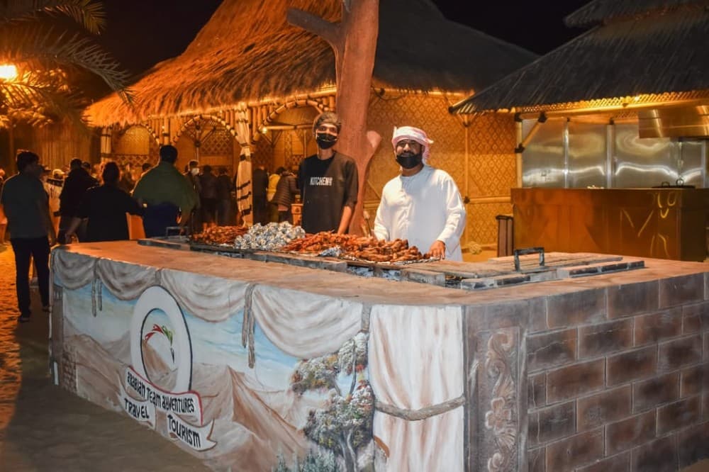 Dubai: Red Dune Safari Camel Ride Sandboarding and Dinner | ®ExcursionMania - Image 5