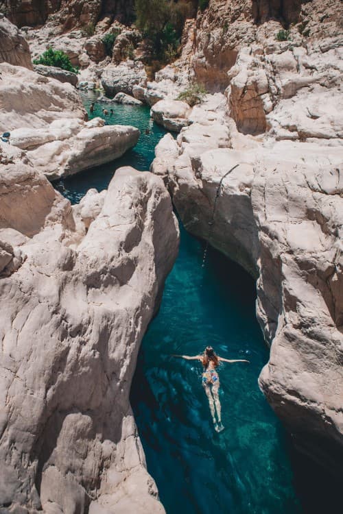 From Muscat: Wadi Shab & Bimah Sinkhole Adventure | ®ExcursionMania - Image 7
