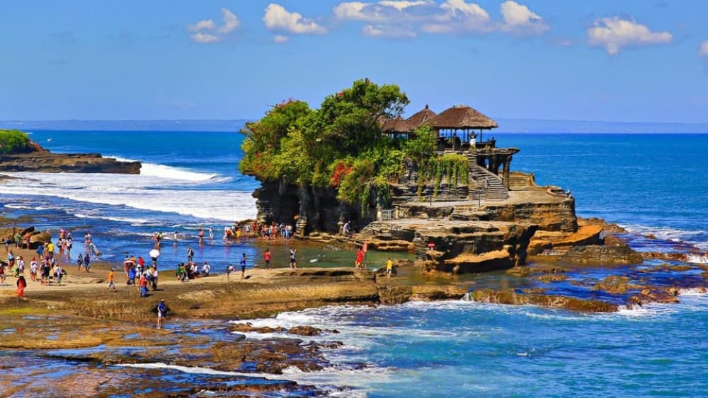Ubud: Jungle Club, Waterfall, Market, and Tanah Lot Tour | ®ExcursionMania - Image 6