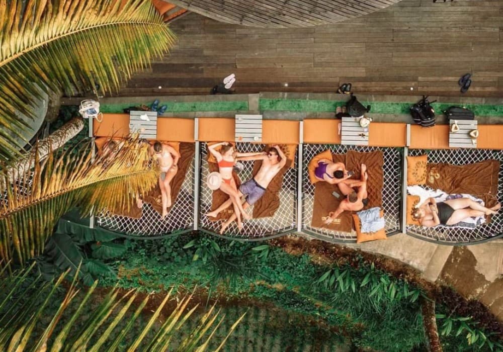 Ubud: Jungle Club, Waterfall, Market, and Tanah Lot Tour | ®ExcursionMania - Image 7