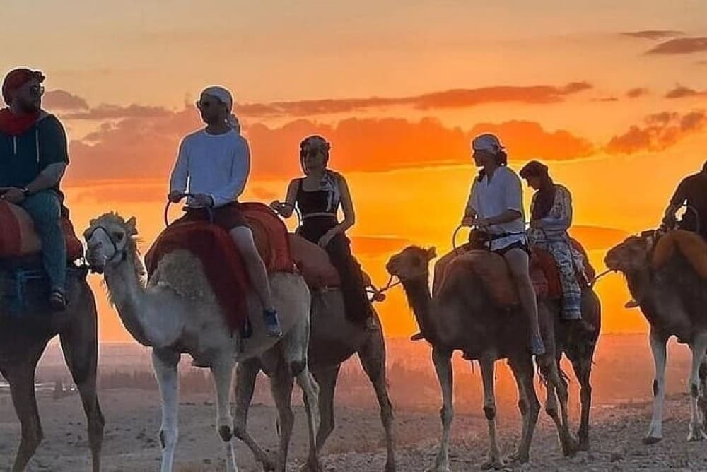 Dinner and Sunset Camel Ride at desert Agafay Marrakech | ®ExcursionMania - Image 1