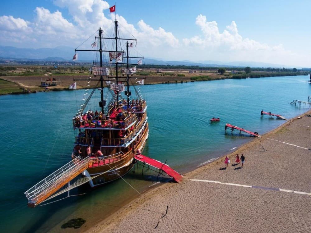 Side: Dolphin Island Boat Trip with Lunch & Unlimited Soft Drinks | ®ExcursionMania - Image 1