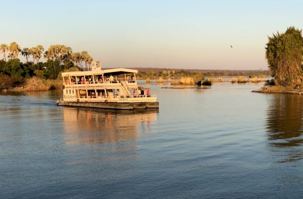 Victoria Falls Guided Tour  Sunset Boat Cruise | ®ExcursionMania - Image 1