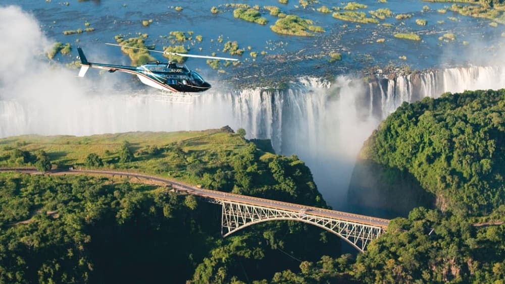 Victoria Falls Guided Tour  Sunset Boat Cruise | ®ExcursionMania - Image 3