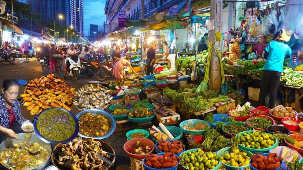 Phnom Penh: Morning Foodie & Market Tour by Vespa | ®ExcursionMania - Image 5