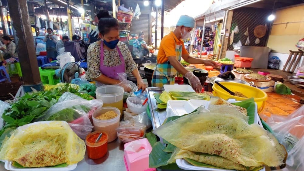Phnom Penh: Morning Foodie & Market Tour by Vespa | ®ExcursionMania - Image 9