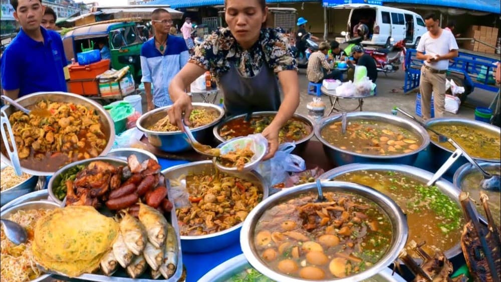 Phnom Penh: Morning Foodie & Market Tour by Vespa | ®ExcursionMania - Image 10