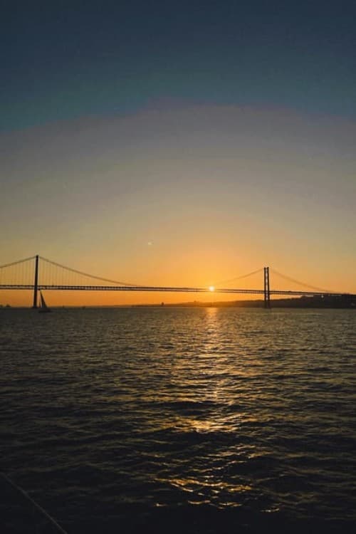 Lisbon: 2h Private Luxury Sunset Cruise with Welcome Drink | ®ExcursionMania - Image 3