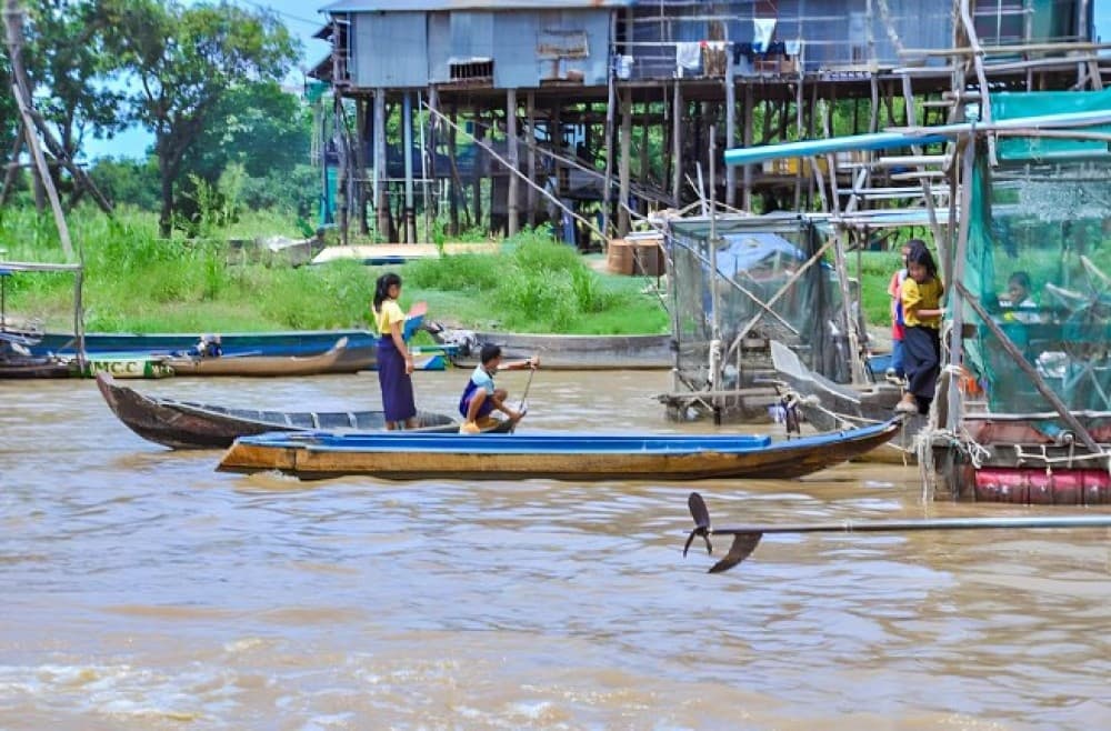 Siem Reap: Floating Village Sunset Boat Guided Vespa Tour | ®ExcursionMania - Image 2