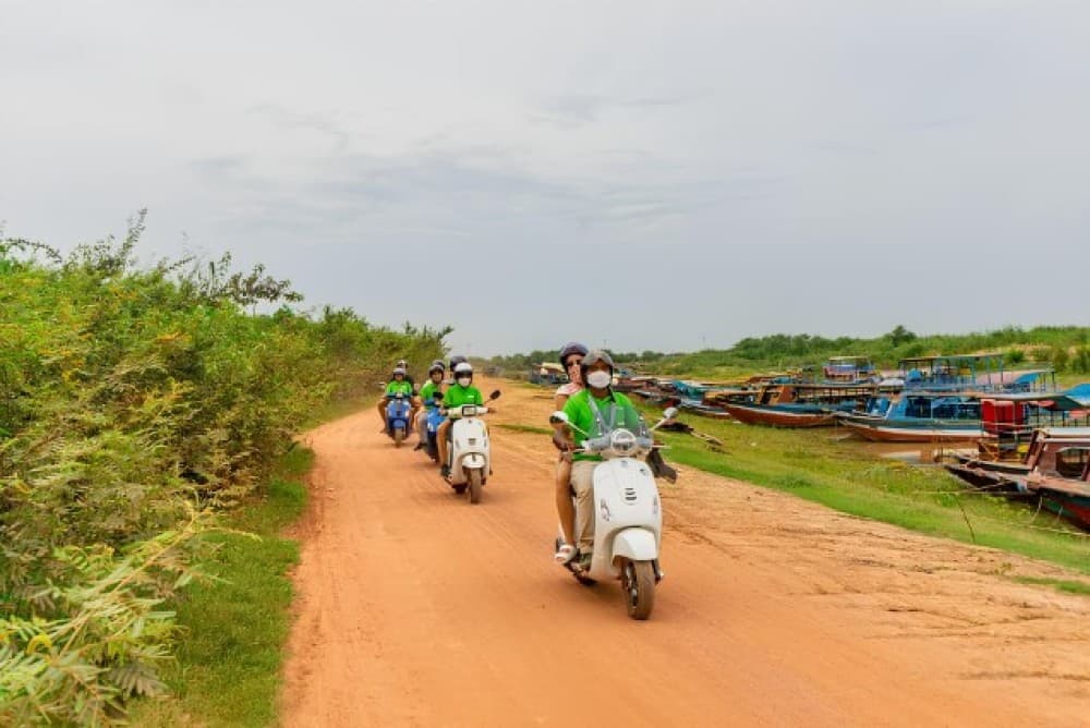 Siem Reap: Floating Village Sunset Boat Guided Vespa Tour | ®ExcursionMania - Image 4