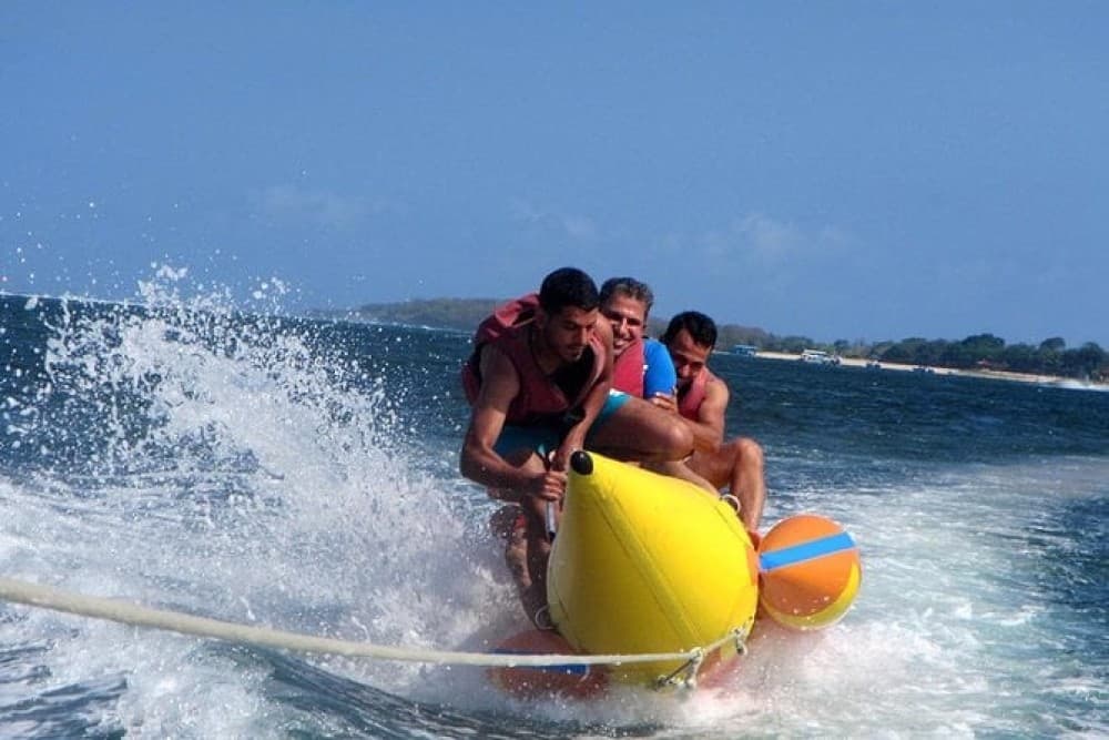 Day Tour Bali Water Sport and Uluwatu Sunset with Kecak Dance | ®ExcursionMania - Image 4