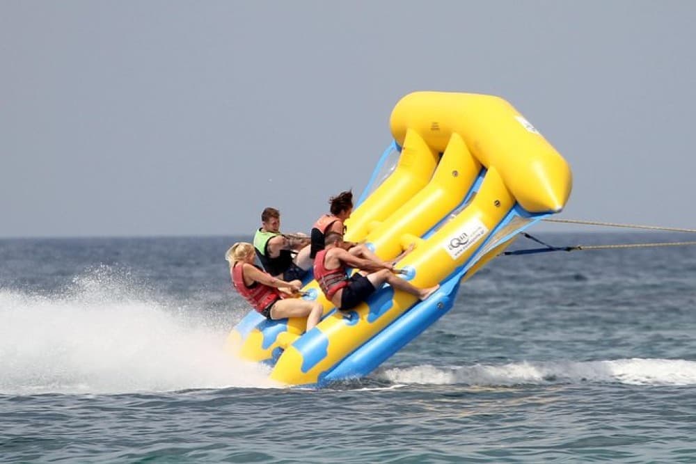 Day Tour Bali Water Sport and Uluwatu Sunset with Kecak Dance | ®ExcursionMania - Image 5