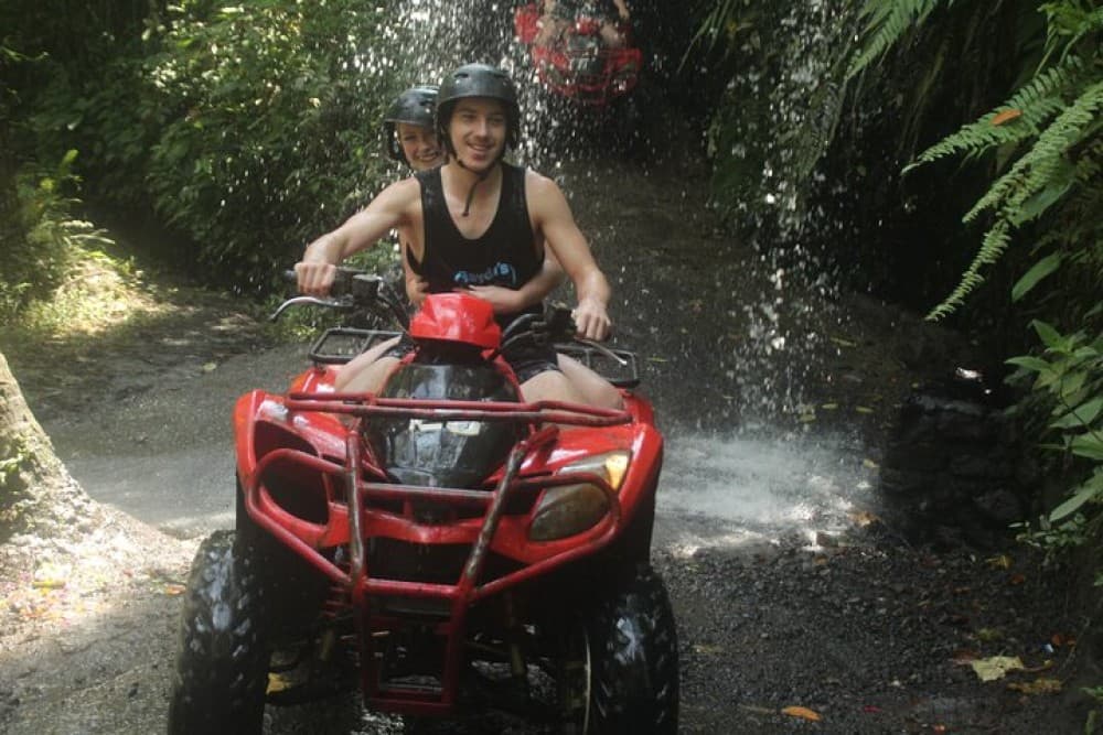 ATV Quad Bike Through Tunnel and Waterfall | ®ExcursionMania - Image 1