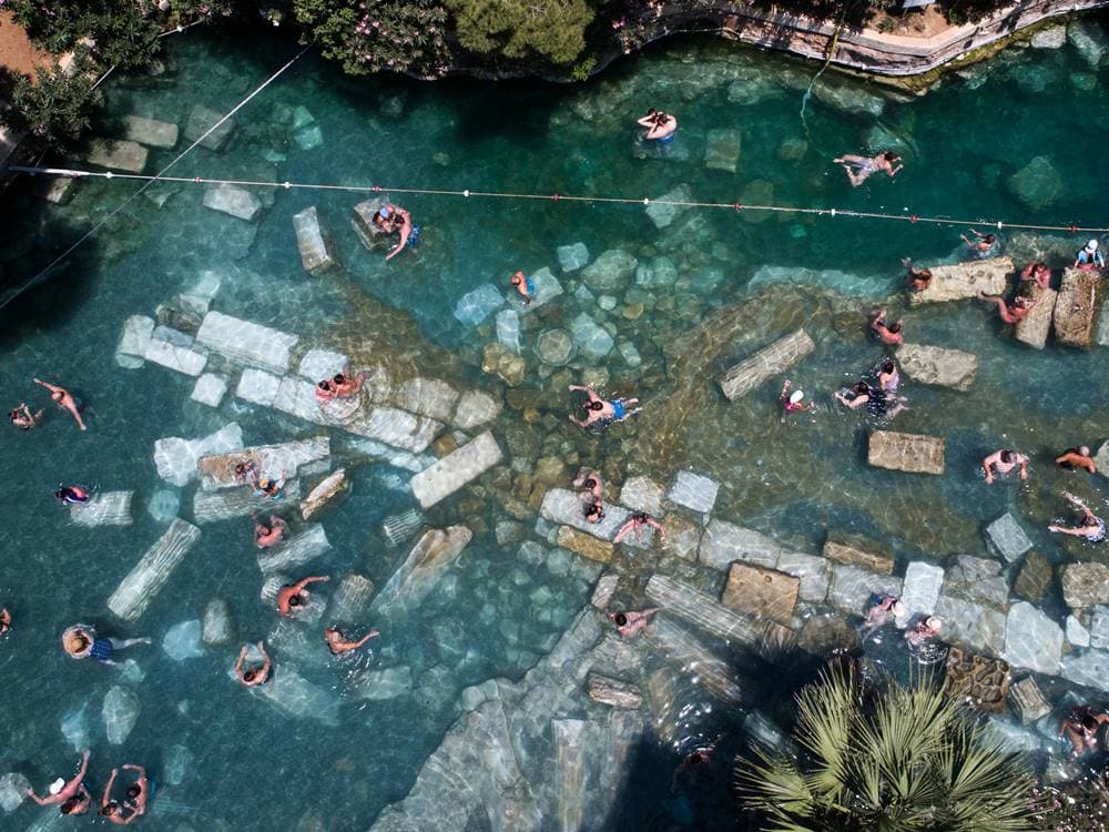 From Selcuk to Pamukkale: A Day of Thermal Springs and Timeless Ruins | ®ExcursionMania - Image 6