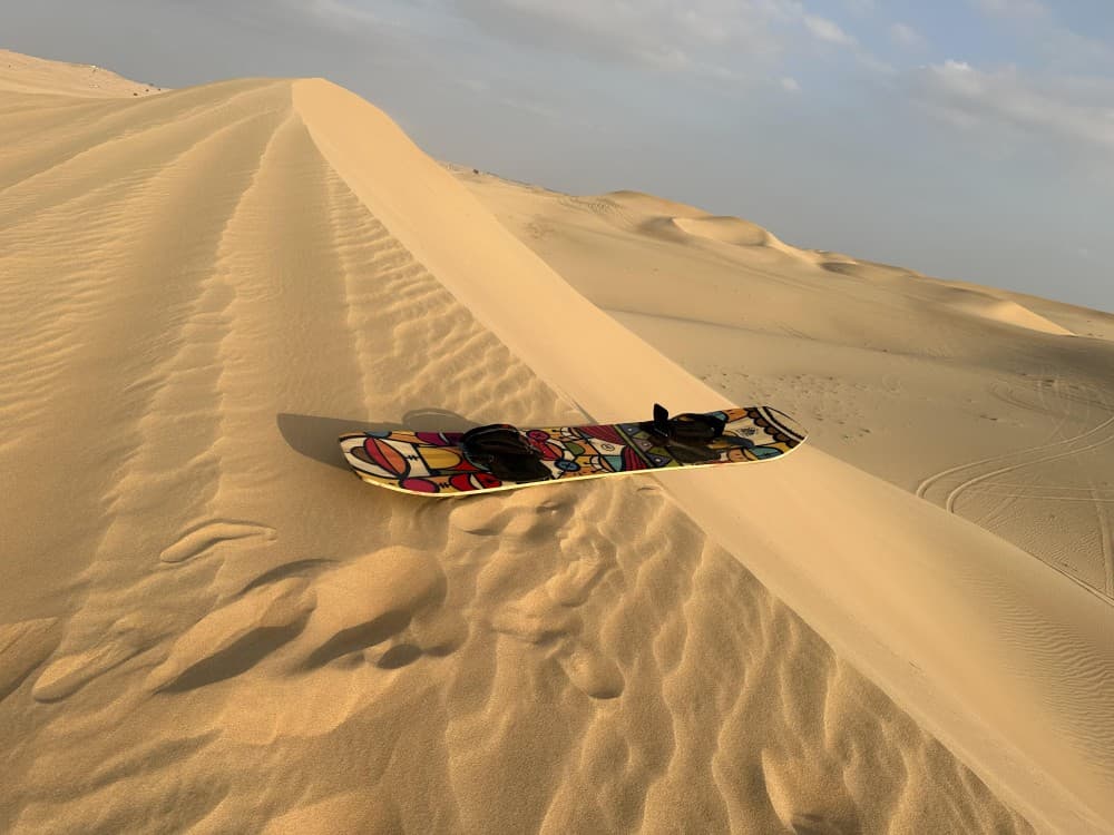 Abu Dhabi: Evening Desert Safari with Camel Ride, BBQ & Live Show | ®ExcursionMania - Image 1