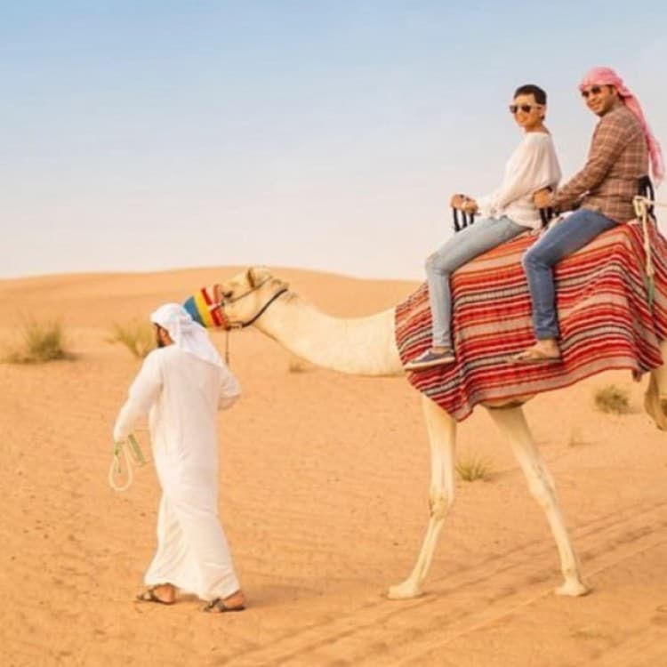 Dubai Desert Safari with BBQ Dinner, Camel Ride, Sandboard & Quad Bike | ®ExcursionMania - Image 5