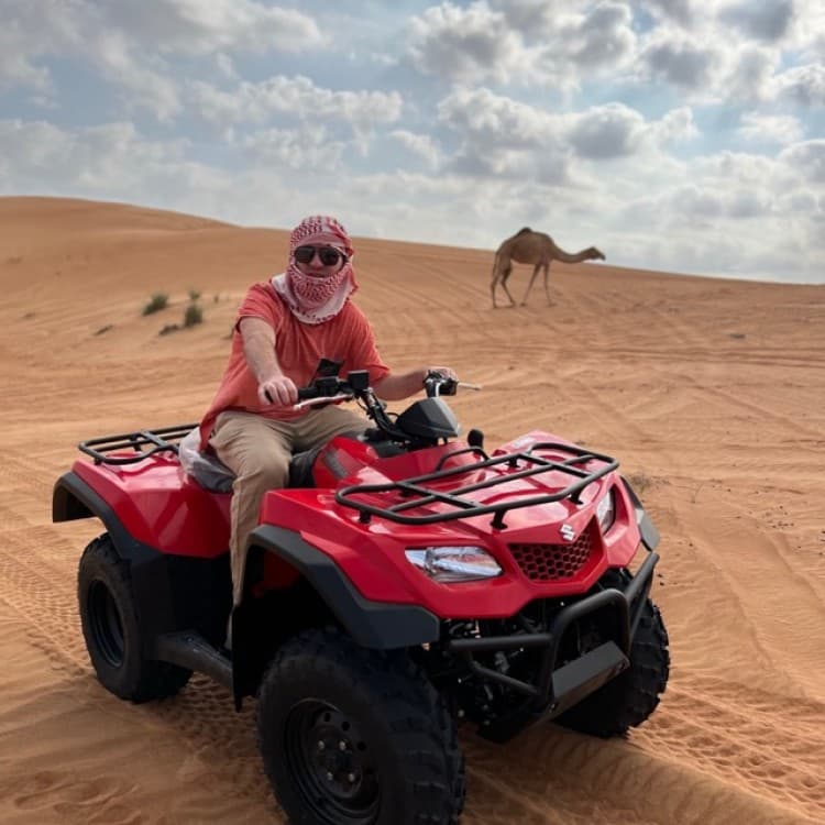 Dubai Desert Safari with BBQ Dinner, Camel Ride, Sandboard & Quad Bike | ®ExcursionMania - Image 10