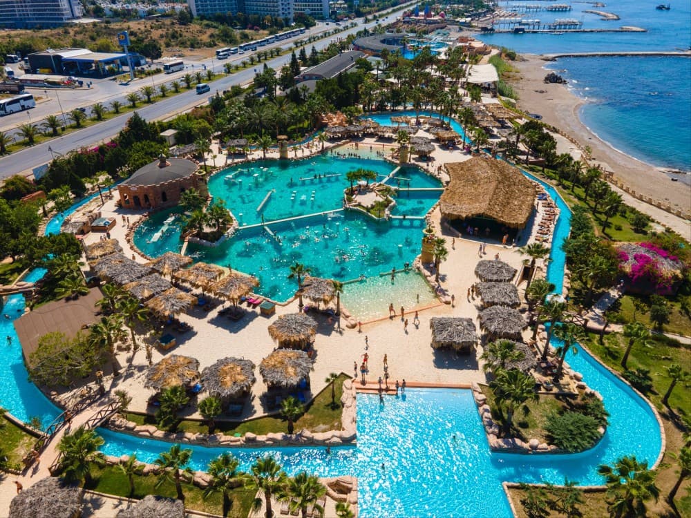 Side: Swim with Dolphin w/ Hotel Transfer | ®ExcursionMania - Image 1