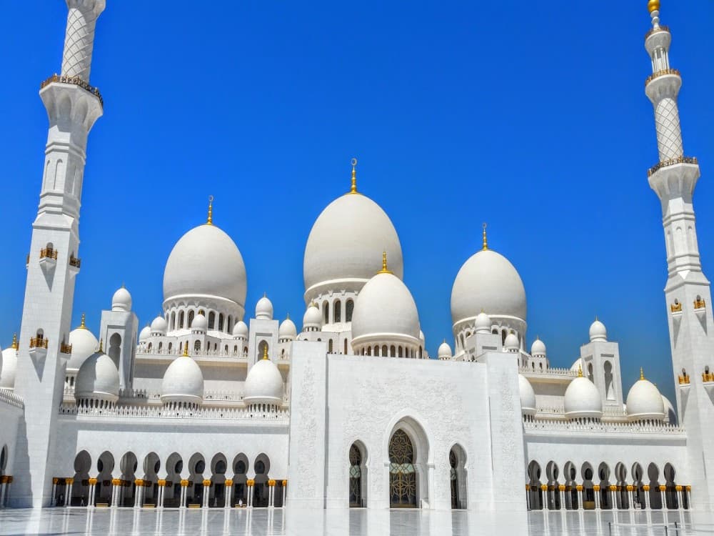 From Abu Dhabi: Grand Mosque Royal Palace and Etihad Tower | ®ExcursionMania - Image 1