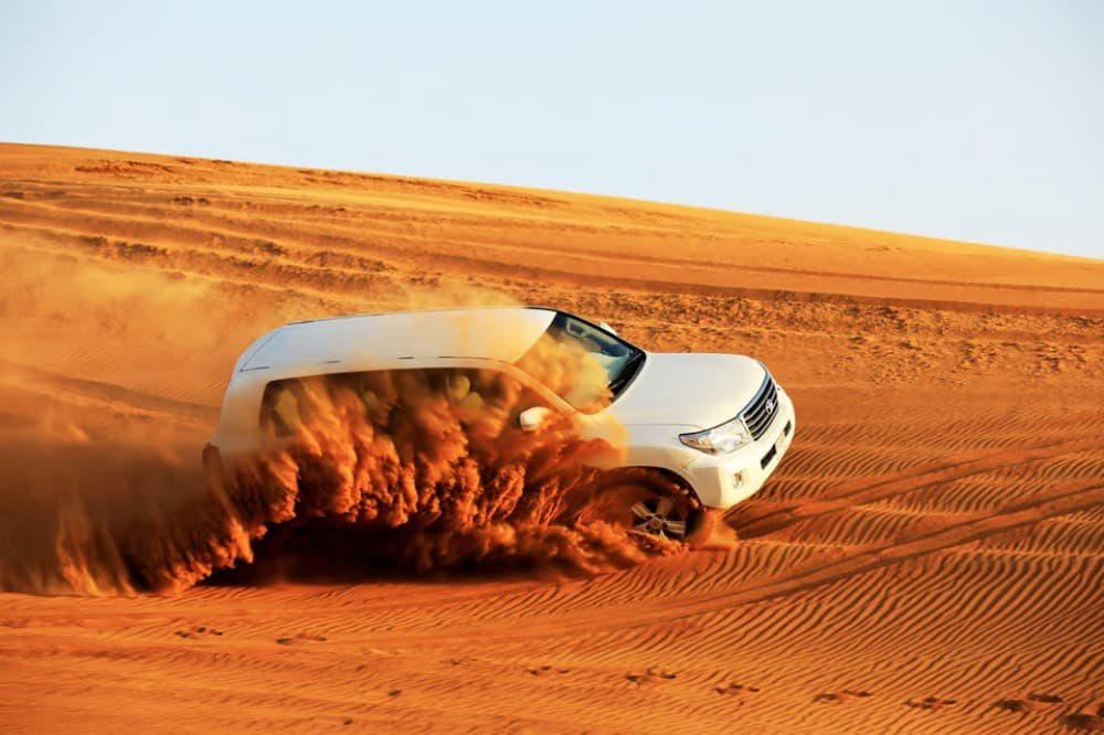 Doha: Sunset Desert Safari with Camel Ride and Sandboarding | ®ExcursionMania - Image 9