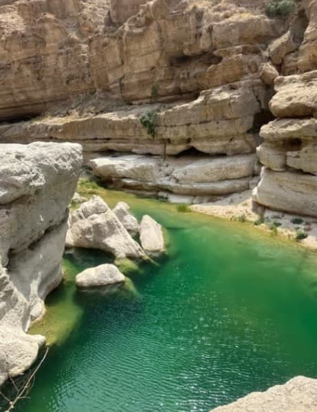 Oman’s Hidden Gems: Wadi Shab & Bimmah Sinkhole | ®ExcursionMania