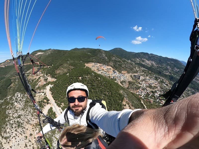 From Antalya: Paragliding Flight at Olympos Tahtali Mountain | ®ExcursionMania - Image 1