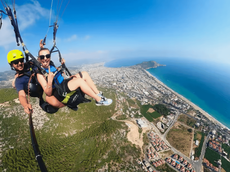 Alanya: Tandem Paragliding Experience with Hotel Pickup | ®ExcursionMania - Image 1