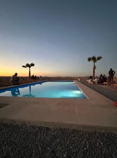 Agafay Desert: Sunset Camel Ride & Moroccan Dinner with Pool | ®ExcursionMania - Image 1