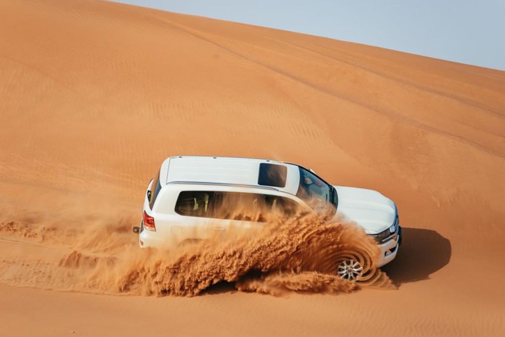 Dubai: Desert Safari, Camel Ride, Sandboarding, Quad Bike